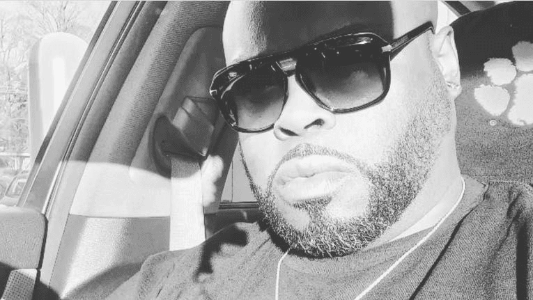 John Simpson — Owner & Master Barber at Divine Kutz